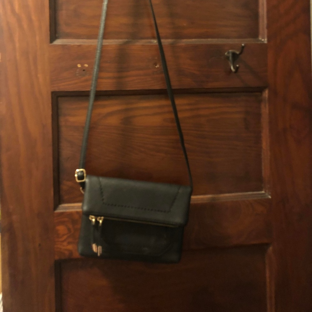 small black over the shoulder bag